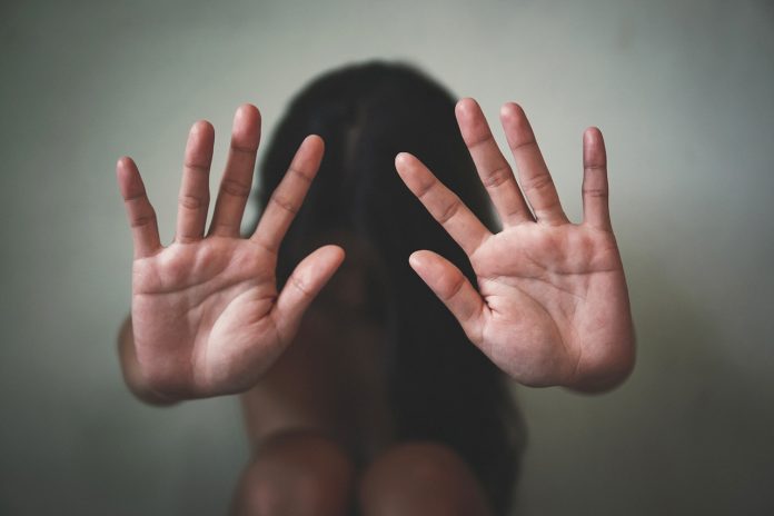 Women bondage lift hands against violence against women, interna